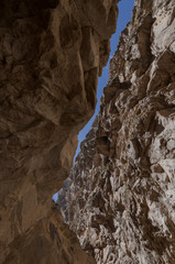 precipice formed by very close rock walls in the duck canyon, peru