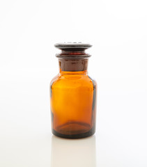 Brown drugs glass container isolated on white background