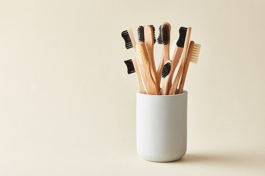 Cup of organic wooden toothbrushes