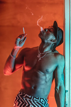 black man in neon light