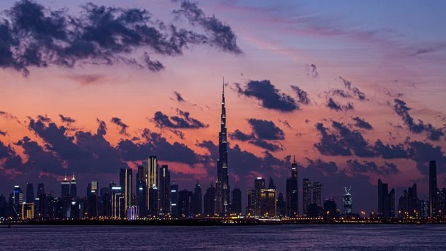 View of Burj Khalifa Skyline from the Dubai Creek Harbour Sunset timelapse.