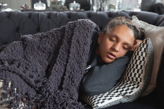 Portrait Of A Pretty Teen Girl Sleeping On A Couch