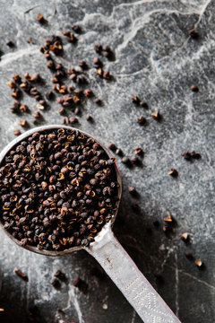Close up of black pepper seeds.