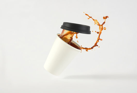 Coffee in Paper Cup Splash