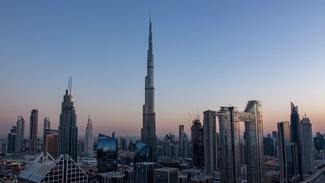 View of Burj Khalifa Dubai Downtown skyline overview at sunset
