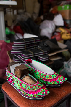 Traditional Chinese shoes With A Hand Stretcher