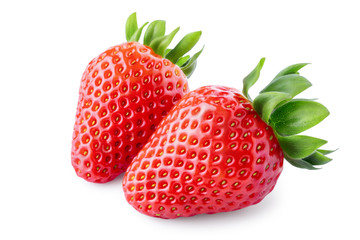 Red strawberry fruits with green leaves isolated on white background. Clipping path.