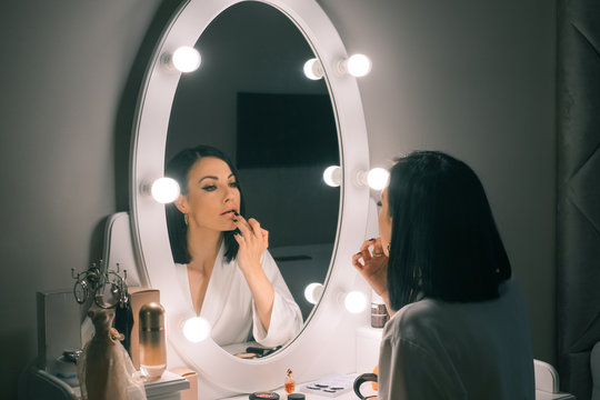 Beautiful Woman Doing her Make up