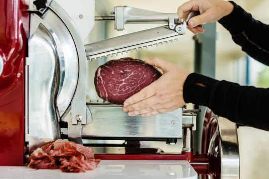 Slicing Meat On A Vintage Rotary Slicer