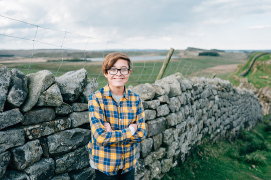 Smiling boy alongside Hadrian's wall