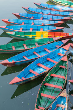 Colorful Wooden Boats on a Lake