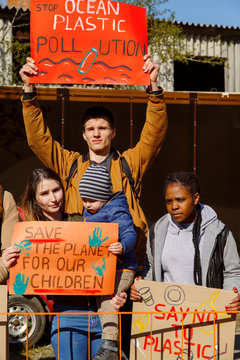 Multiracial people with banners on demonstration