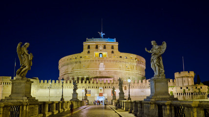 Fototapeta na wymiar Castel Sant'Angelo in Rome, seen from the bridge, by night.