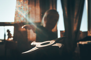 Child throwing a ninja star © Martijn