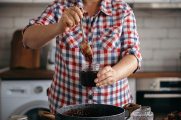Preparing homemade strawberry jam
