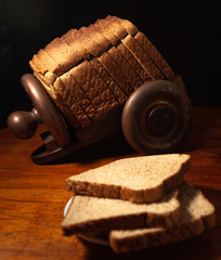 wholemeal bread sliced whit black background 