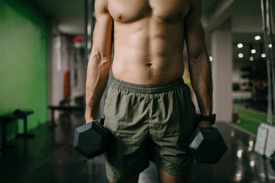 Muscular Man Working Out