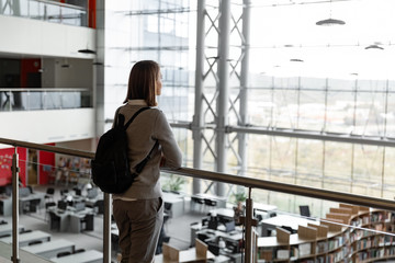 Casual inspired student in modern library