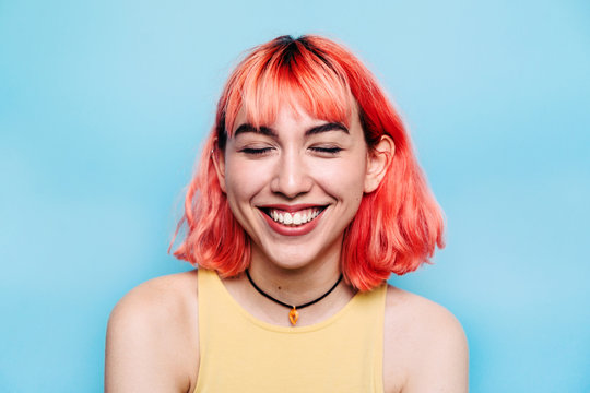 Laughing teen with red hair