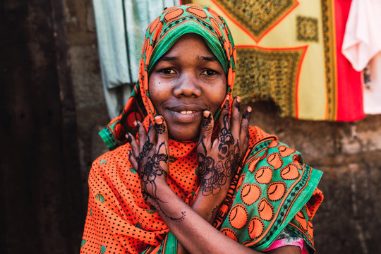 Portrait, Woman showing her henna tattoo on hands