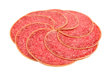 Salami slices isolated on white background.