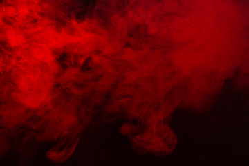 Red steam on a black background.
