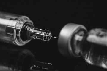 Close up of Medical vials for injection with a syringe and ampoule