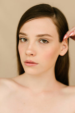Portrait of natural look girl with clean skin