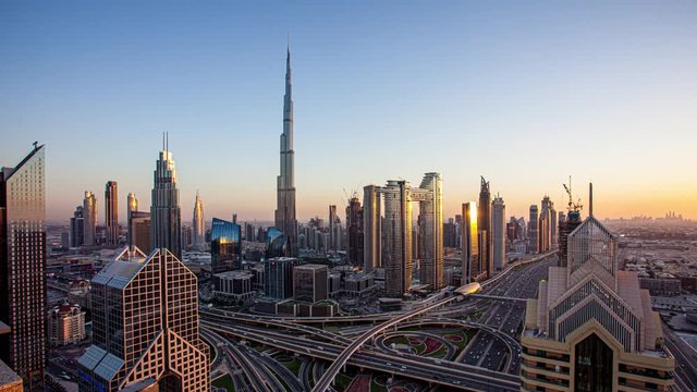 View of Burj Khalifa Dubai Downtown skyline overview at sunset