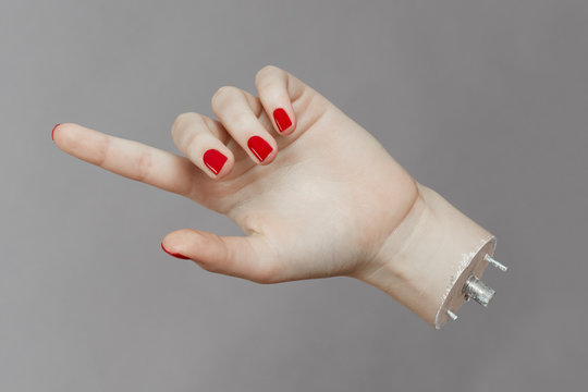 Real mannequin hand with red nail polish