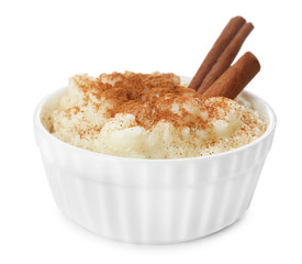 Delicious rice pudding with cinnamon isolated on white