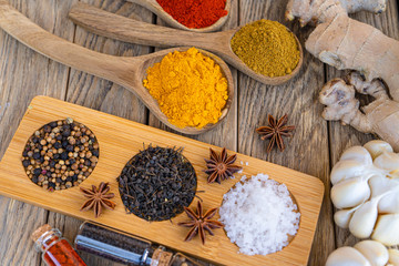 Colourful various herbs and spices for cooking on  background