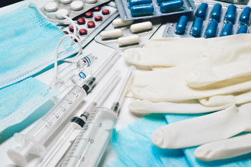 Medical equipment. Coronavirus protection. Medical face mask. Sterile gloves. Syringe and drugs....