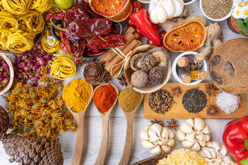 Colourful various herbs and spices for cooking on  background