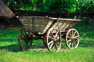 Fototapeta na wymiar Rural cart in the Ukrainian estate. Ukraine. Ukrainian traditions. Carpathians.