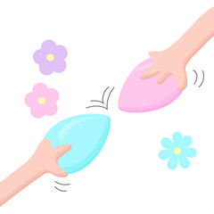 Two hands hold eggs to fight whose egg is stronger. Multi-colored Easter eggs.