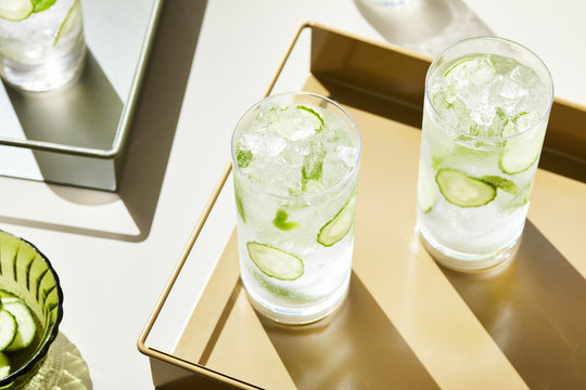 Transparent glasses of mocktail with ice