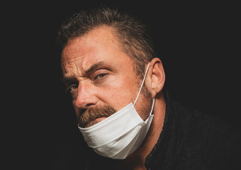 man wearing protective breathing mask