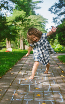 Little Kid Playing Outside