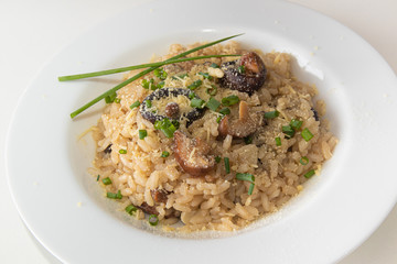 Risotto with funghi and .chopped chives