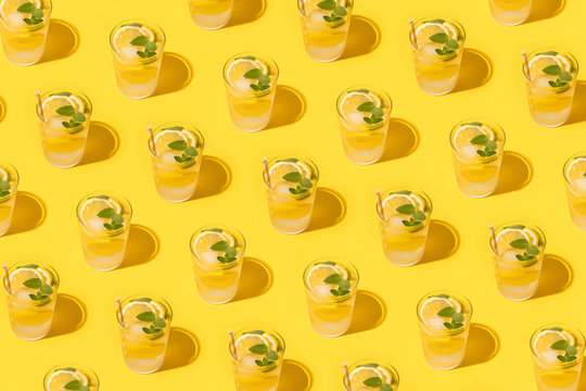 Refreshing lemon infused water with straws