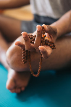 Adult african american man meditating at home