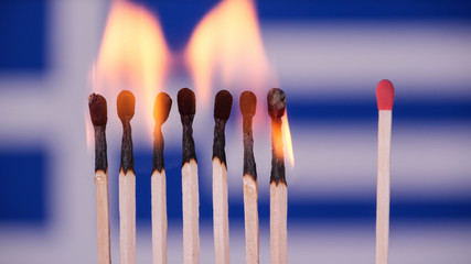 Stay at home, stop Coronavirus epidemic. Burning matches on Italy flag background. Concept: spreading epidemic, domino effect, COVID-19,  isolated burning matches, pray for Italy