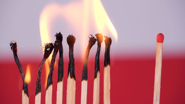 Coronavirus outbreak, social distancing concept. Burning matches on Polish flag background. Concept: stop spreading virus, domino effect, COVID-19 pandemic, pray for Poland - Powered by Adobe