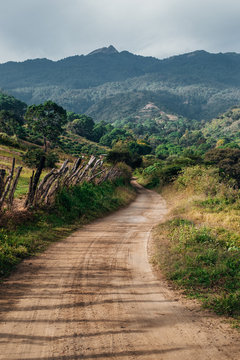Countryside gravel road through the mountains