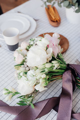 beautiful bridal wedding bouquet on white table