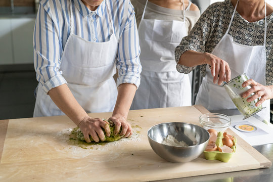 Kitchen class lesson with people cooking food - Powered by Adobe