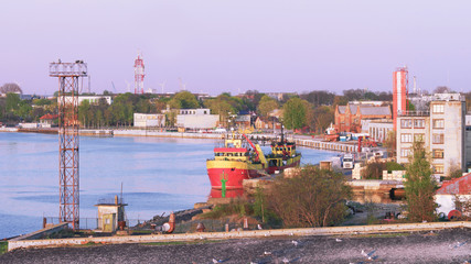 Ship at Marina in Ventspils in Latvia at sunset