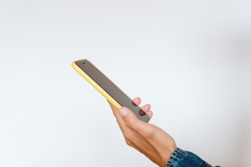 close up view of a woman using mobile phone indoors. Technology concept