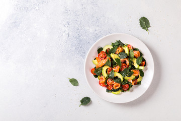 Salmon Salad with Vitamins in vegetables, herbs and avocado